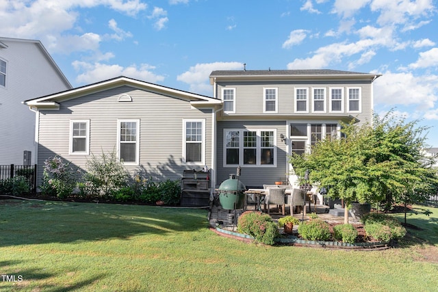1501 Heritage Reserve Ct, Wake Forest, NC 27587 - rear view of property with a patio and a lawn