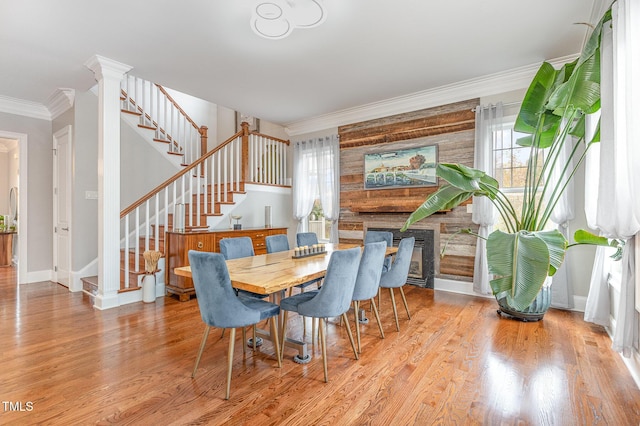 1501 Heritage Reserve Ct, Wake Forest, NC 27587 - dining area featuring stairs, plenty of natural light, ornamental molding, and wood finished floors