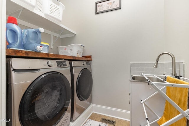 1501 Heritage Reserve Ct, Wake Forest, NC 27587 - washroom featuring independent washer and dryer and baseboards