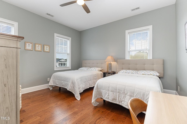 1501 Heritage Reserve Ct, Wake Forest, NC 27587 - bedroom featuring multiple windows, wood finished floors, and ceiling fan