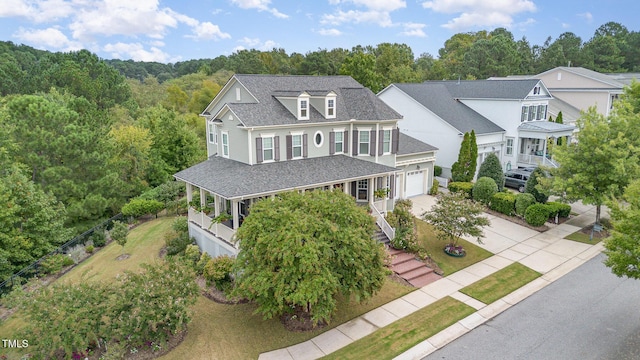 1501 Heritage Reserve Ct, Wake Forest, NC 27587 - view of front facade featuring concrete driveway, a garage, roof with shingles, and a porch