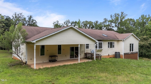 129 Shaman Dr, Louisburg, NC 27549 - rear view of house with a patio area, roof with shingles, and a lawn