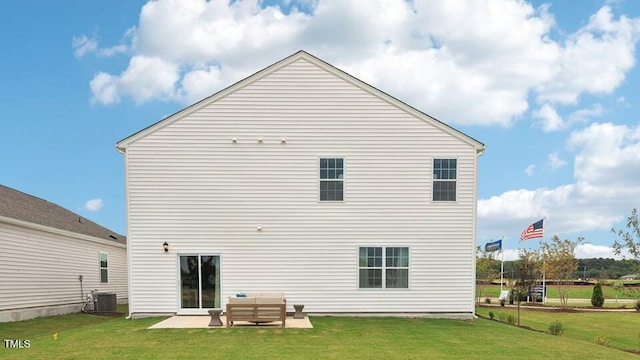716 Holstein Dairy Way, Wake Forest, NC 27587 - rear view of property featuring a lawn, a patio, and an outdoor hangout area