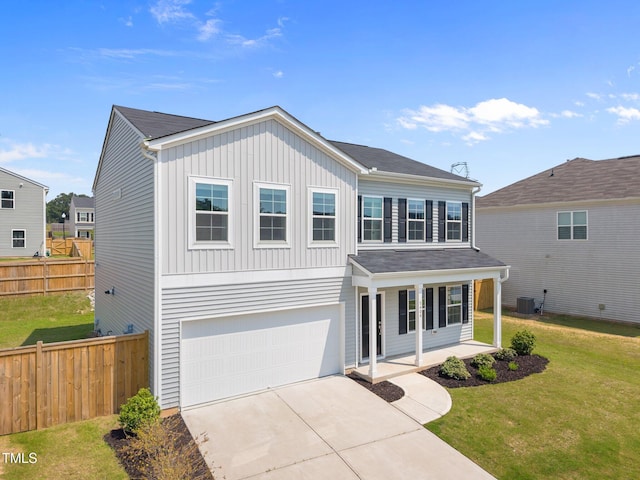 5404 Rutledgeville Ln, Knightdale, NC 27545 - traditional home featuring board and batten siding, a garage, covered porch, and driveway