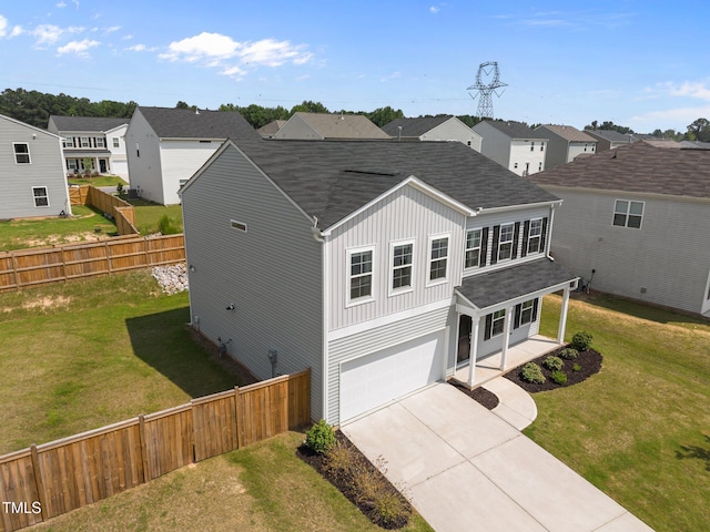 5404 Rutledgeville Ln, Knightdale, NC 27545 - traditional-style home featuring an attached garage, board and batten siding, roof with shingles, a residential view, and driveway