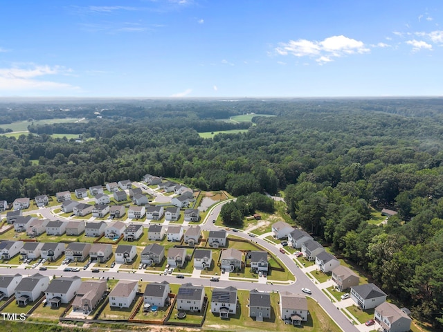 5404 Rutledgeville Ln, Knightdale, NC 27545 - aerial perspective of suburban area with a forest