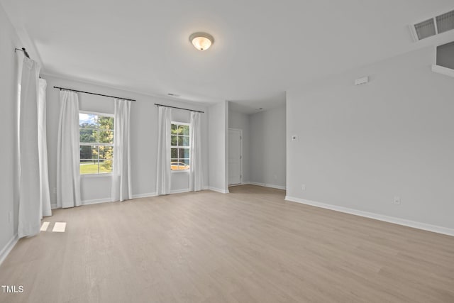 5404 Rutledgeville Ln, Knightdale, NC 27545 - spare room with light wood-style flooring and baseboards
