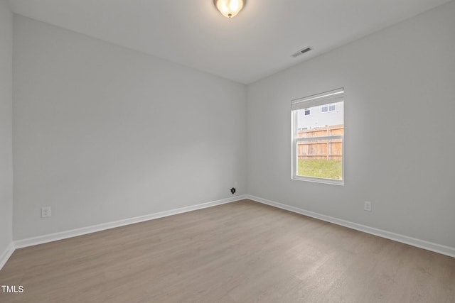 5404 Rutledgeville Ln, Knightdale, NC 27545 - empty room with wood finished floors and baseboards
