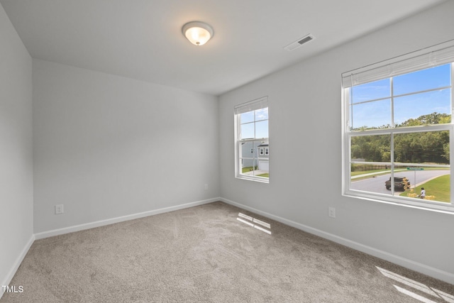 5404 Rutledgeville Ln, Knightdale, NC 27545 - carpeted empty room with baseboards