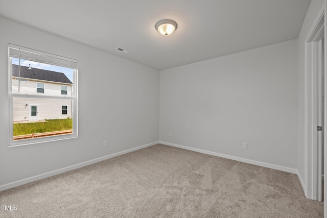 5404 Rutledgeville Ln, Knightdale, NC 27545 - carpeted spare room with baseboards