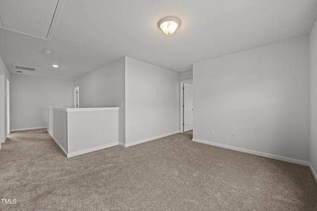 5404 Rutledgeville Ln, Knightdale, NC 27545 - unfurnished room featuring attic access, carpet flooring, and a smoke detector