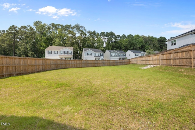 5404 Rutledgeville Ln, Knightdale, NC 27545 - fenced backyard with a residential view