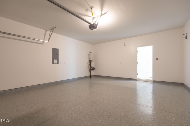 5404 Rutledgeville Ln, Knightdale, NC 27545 - garage featuring electric panel and a garage door opener