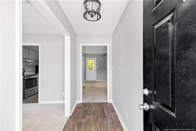 3326 Donnett Dr, Spring Lake, NC 28390 - entrance foyer featuring wood finished floors, carpet floors, and a chandelier