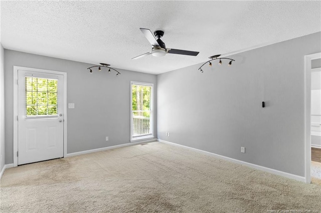3326 Donnett Dr, Spring Lake, NC 28390 - carpeted empty room with ceiling fan and a textured ceiling