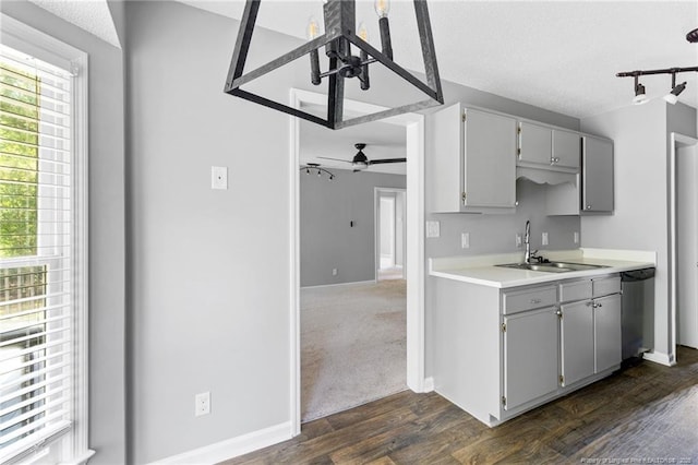 3326 Donnett Dr, Spring Lake, NC 28390 - kitchen with dishwasher, gray cabinets, dark wood finished floors, a ceiling fan, and light countertops
