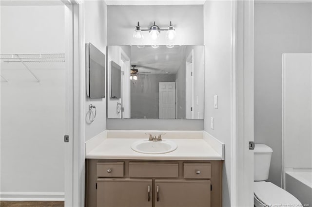 3326 Donnett Dr, Spring Lake, NC 28390 - full bathroom with vanity, ceiling fan, a walk in closet, a bath, and a shower