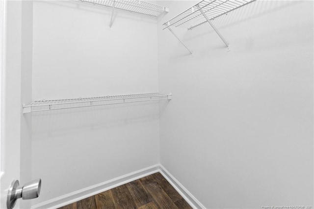 3326 Donnett Dr, Spring Lake, NC 28390 - walk in closet with dark wood finished floors