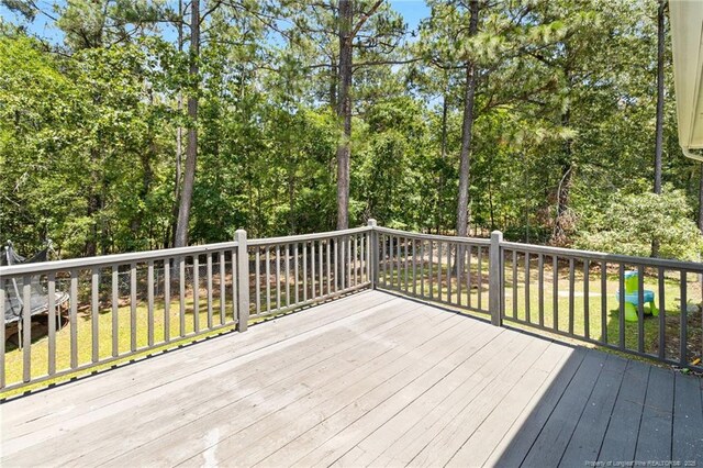 3326 Donnett Dr, Spring Lake, NC 28390 - wooden deck featuring view of scattered trees