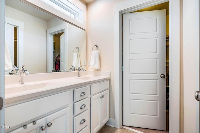 438 Granite Mill Blvd, Chapel Hill, NC 27516 - bathroom with double vanity and a walk in closet