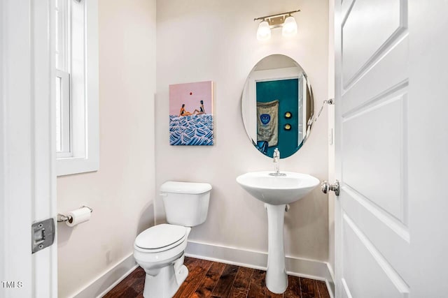 438 Granite Mill Blvd, Chapel Hill, NC 27516 - half bathroom featuring baseboards and wood finished floors