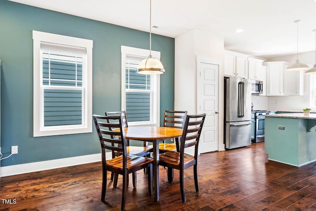 438 Granite Mill Blvd, Chapel Hill, NC 27516 - dining room featuring dark wood-style floors and recessed lighting
