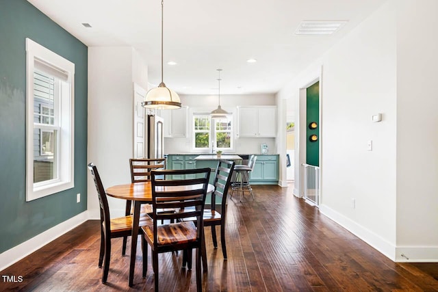 438 Granite Mill Blvd, Chapel Hill, NC 27516 - dining space with dark wood-style floors and recessed lighting
