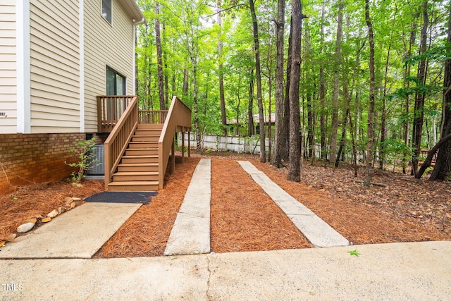 4316 American Dr, Durham, NC 27705 - view of yard featuring stairs and a wooden deck