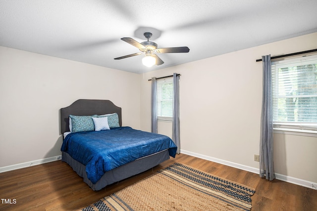 4316 American Dr, Durham, NC 27705 - bedroom with wood finished floors and a ceiling fan
