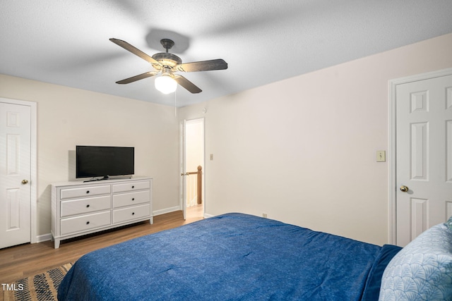 4316 American Dr, Durham, NC 27705 - bedroom with wood finished floors and ceiling fan