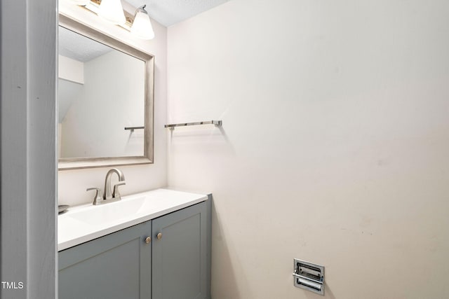 4316 American Dr, Durham, NC 27705 - bathroom with vanity and a textured ceiling
