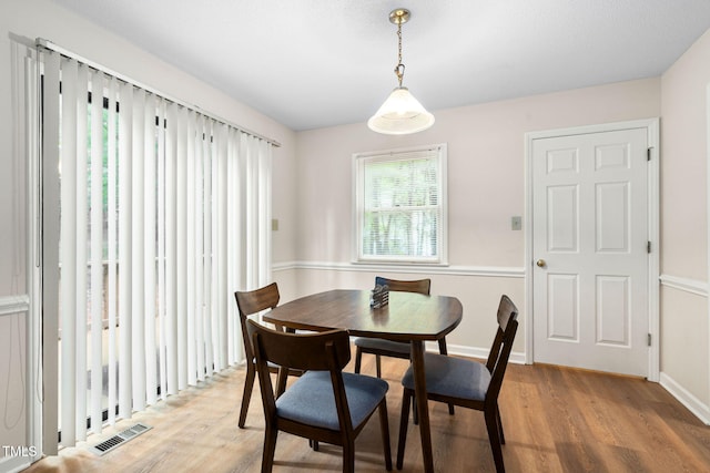 4316 American Dr, Durham, NC 27705 - dining area with light wood-style floors
