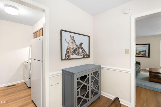 4316 American Dr, Durham, NC 27705 - corridor with light wood-style floors and baseboards