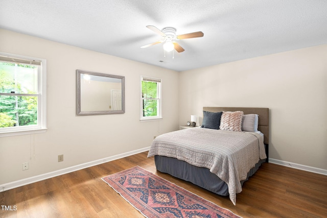 4316 American Dr, Durham, NC 27705 - bedroom featuring wood finished floors and ceiling fan