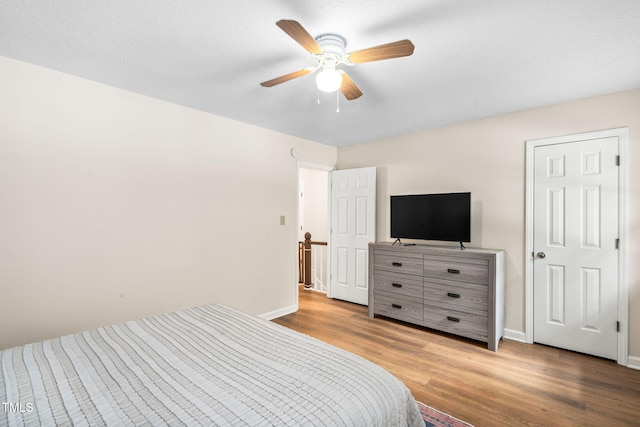 4316 American Dr, Durham, NC 27705 - bedroom featuring wood finished floors and a ceiling fan