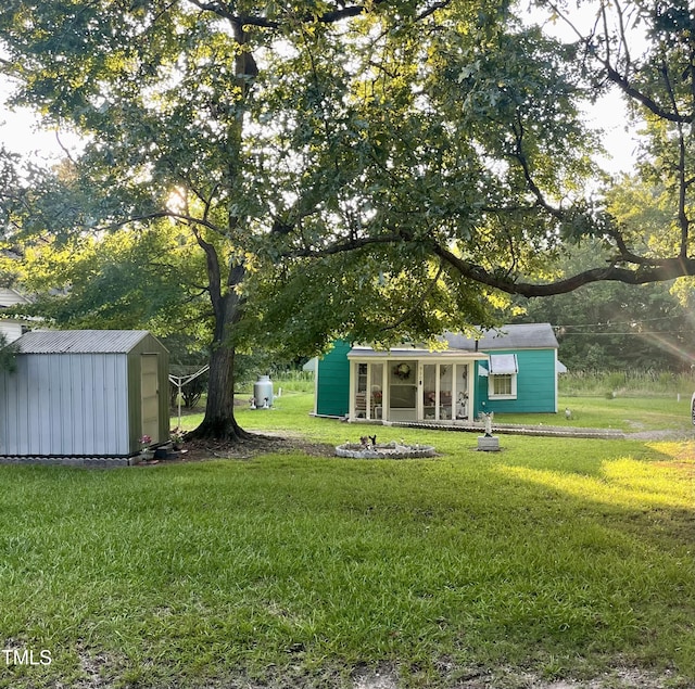930 Rand St, Smithfield, NC 27577 - view of green lawn featuring an outbuilding