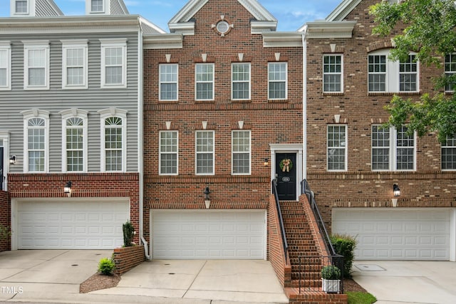 4104 Earl Grey Ct, Raleigh, NC 27612 - multi unit property with brick siding, a garage, and driveway