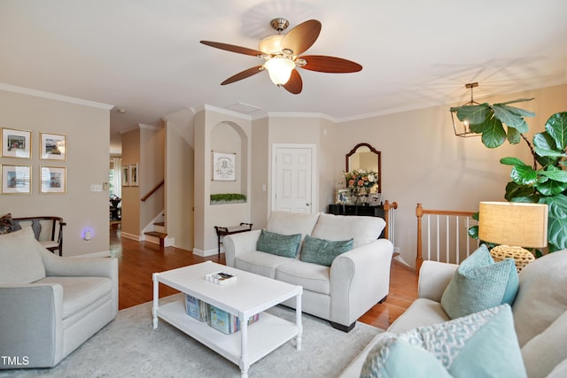 4104 Earl Grey Ct, Raleigh, NC 27612 - living room featuring crown molding, wood finished floors, a ceiling fan, and stairway