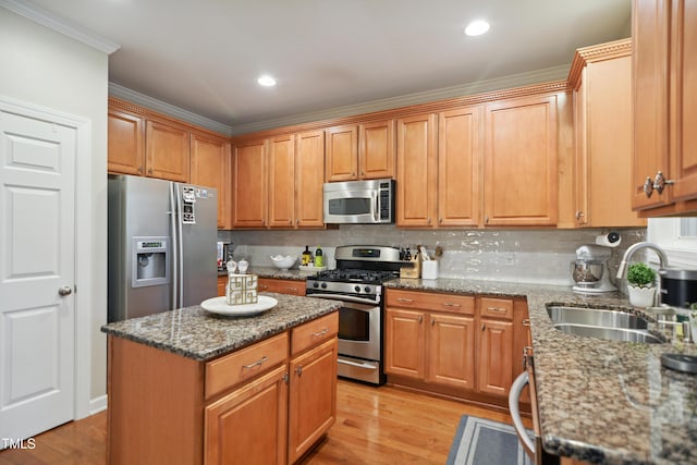 4104 Earl Grey Ct, Raleigh, NC 27612 - kitchen with stainless steel appliances, crown molding, tasteful backsplash, dark stone counters, and light wood-style flooring