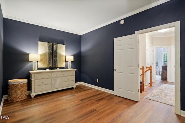 4104 Earl Grey Ct, Raleigh, NC 27612 - bedroom featuring wood finished floors and crown molding