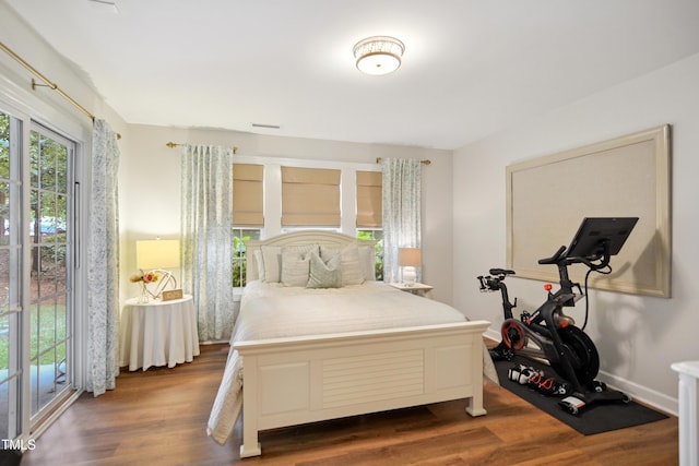 4104 Earl Grey Ct, Raleigh, NC 27612 - bedroom with dark wood-style floors