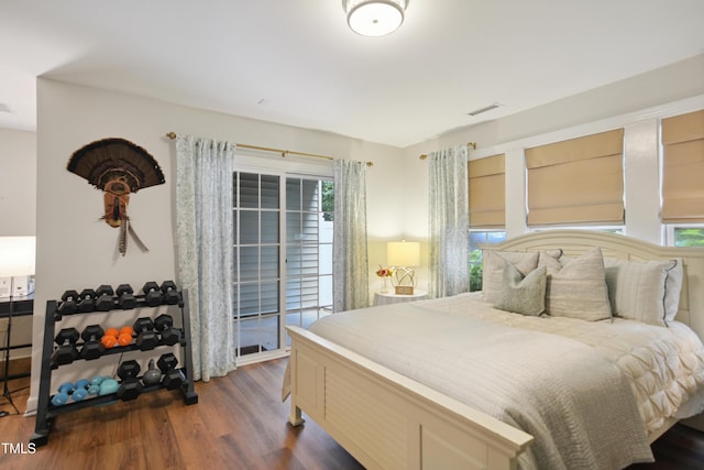 4104 Earl Grey Ct, Raleigh, NC 27612 - bedroom with wood finished floors, access to outside, and multiple windows