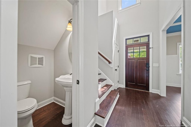 57 Spring Water Ct, Spring Lake, NC 28390 - entryway with wood-type flooring, a towering ceiling, plenty of natural light, and stairs