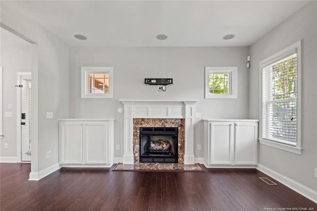57 Spring Water Ct, Spring Lake, NC 28390 - unfurnished living room with dark wood finished floors and a premium fireplace