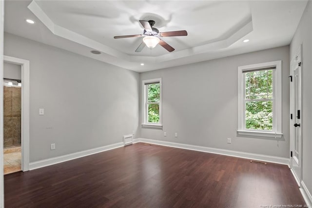 57 Spring Water Ct, Spring Lake, NC 28390 - empty room featuring a raised ceiling, ceiling fan, wood finished floors, and recessed lighting