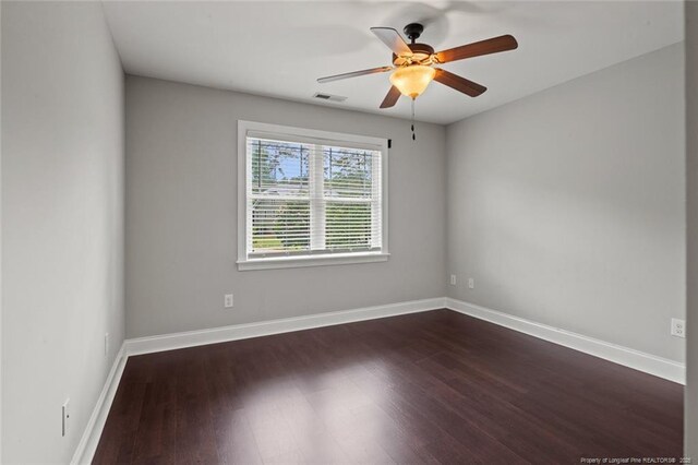 57 Spring Water Ct, Spring Lake, NC 28390 - empty room featuring dark wood-style flooring and a ceiling fan