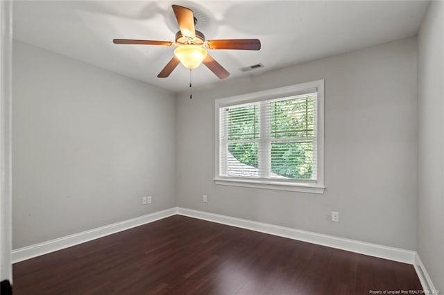 57 Spring Water Ct, Spring Lake, NC 28390 - empty room with dark wood-style floors and a ceiling fan