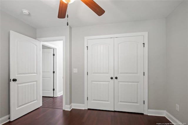 57 Spring Water Ct, Spring Lake, NC 28390 - unfurnished bedroom featuring dark wood-style floors, a closet, and a ceiling fan