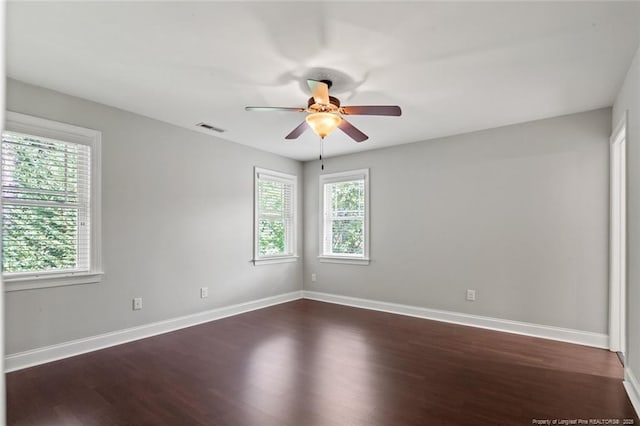 57 Spring Water Ct, Spring Lake, NC 28390 - unfurnished room featuring a ceiling fan and dark wood-type flooring