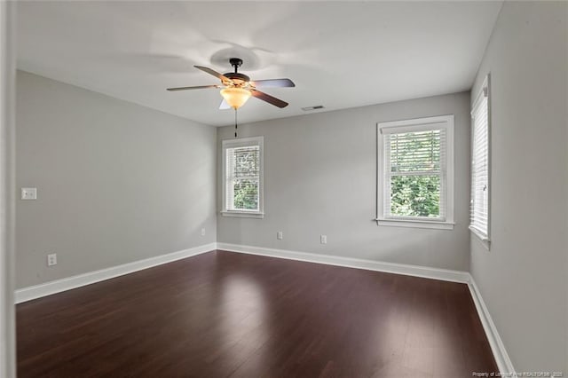 57 Spring Water Ct, Spring Lake, NC 28390 - empty room featuring dark wood-type flooring and ceiling fan